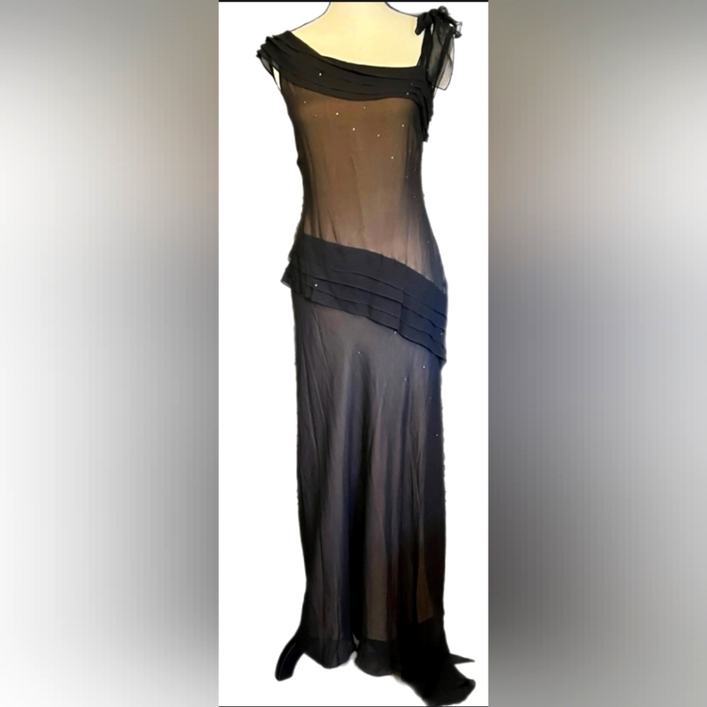 BCBG MAXAZRIA Asymmetrical gown with sheer black over nude.